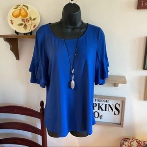 Karen Kane flirty iris top!